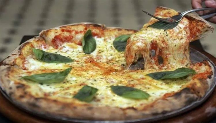 నాన్‌ వెజ్‌ పిజ్జా డెలివరీ.. కోటి పరిహారం కోరిన మహిళ