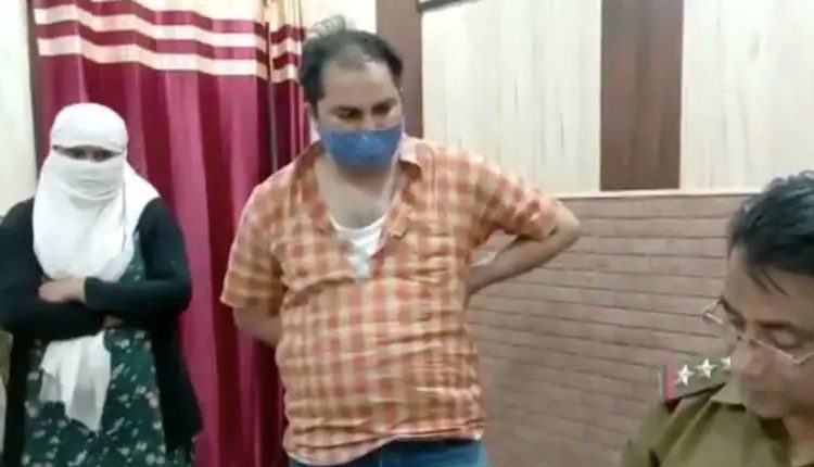 మరో మహిళతో మార్కెట్‌కి వచ్చిన భర్త : నడిరోడ్డుపై దంపతుల బాహాబాహీ!