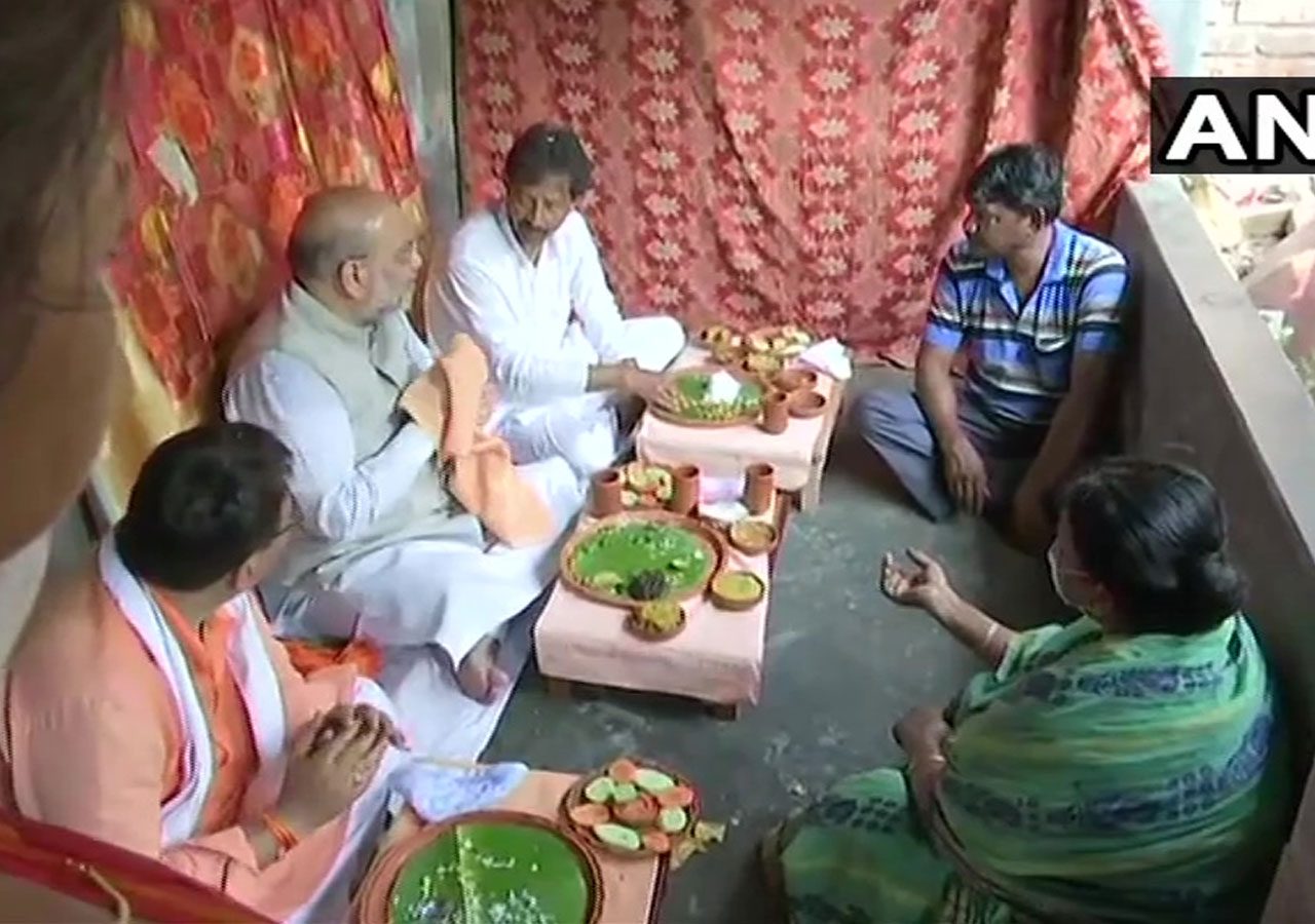 రిక్షా కార్మికుడి ఇంట్లో భోజ‌నం చేసిన హోంమంత్రి అమిత్ షా..!