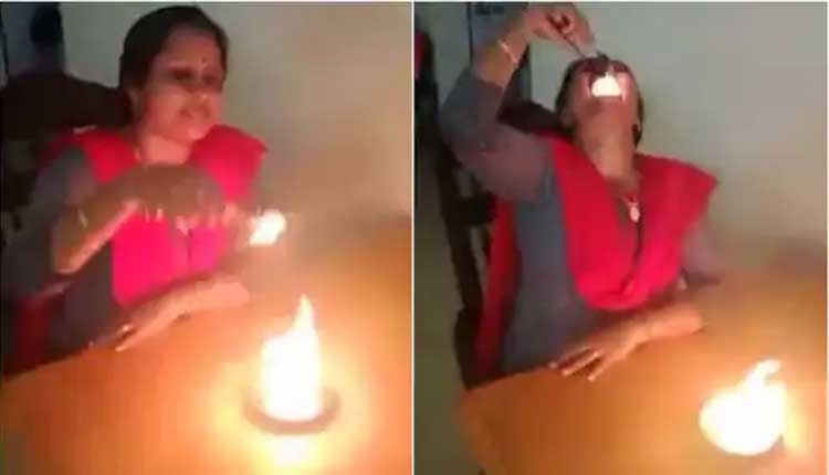 నిప్పుల‌ను ట్యాబ్లెట్‌ల‌లా నోట్లో వేసుకున్న మ‌హిళ‌..వీడియో