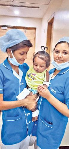 కరోనాను జయించిన చిన్నారి