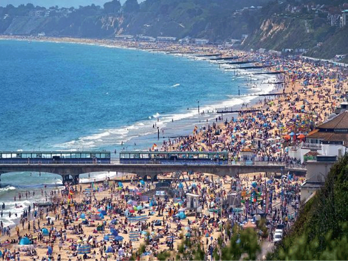 బ్రిట‌న్‌లో మండుతున్న ఎండ‌లు.. స‌ముద్రం ఒడ్డుకు 40 ల‌క్ష‌ల జ‌నం