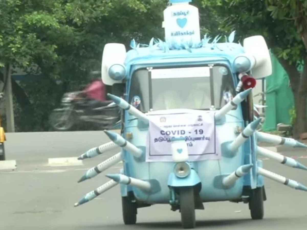 క‌రోనా టీకాపై అవ‌గాహ‌న‌కు వినూత్నంగా ఆటో డిజైన్