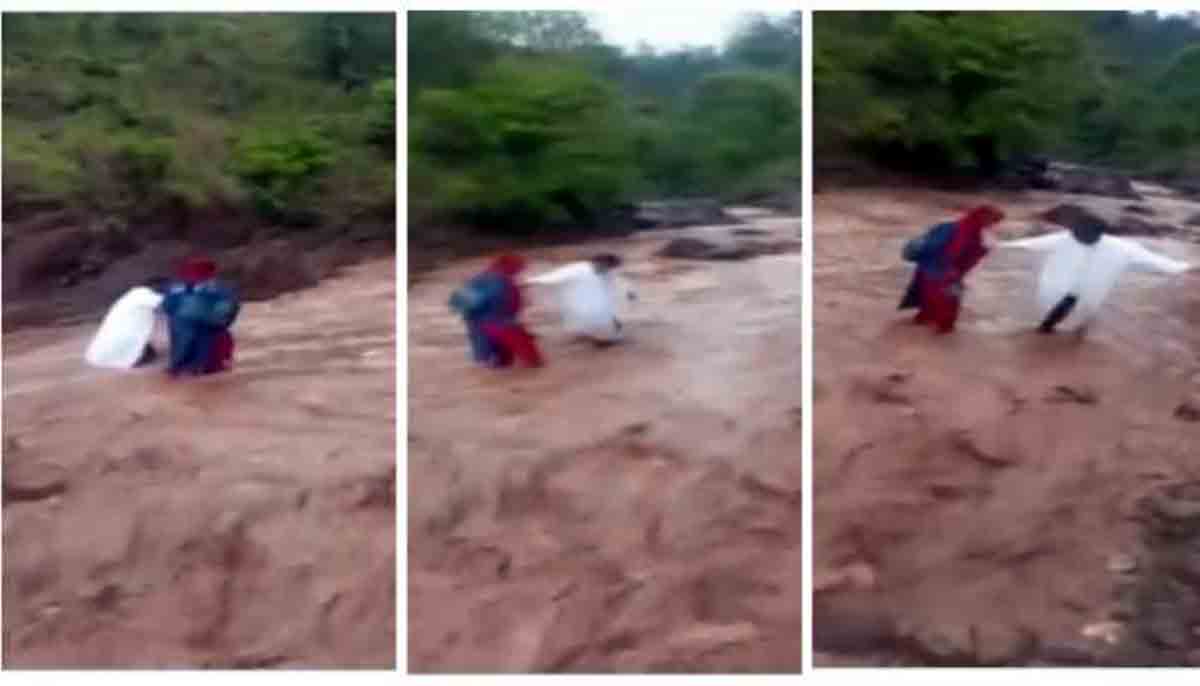 ఓవైపు వ‌ర‌ద‌.. మ‌రోవైపు వృత్తిధ‌ర్మం!  నీటి ప్ర‌వాహాన్ని దాటుకుని టీకాలు వేసిన సిబ్బంది