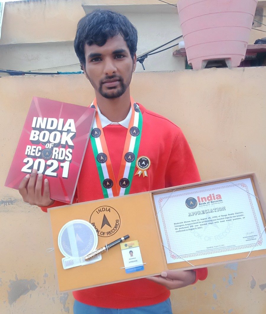 india book of records | ఒంటిచేత్తో చప్పట్లు… గిరిజన విద్యార్థికి ఇండియా బుక్ రికార్డులో చోటు