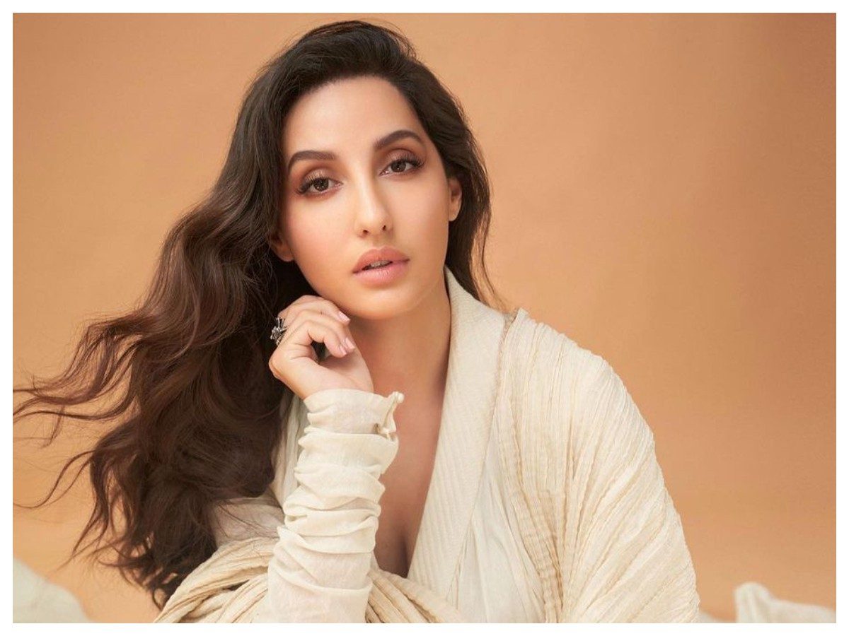 Nora Fatehi | వైట్ డ్రెస్‌లో నోరా ఫతేహి అందాలు