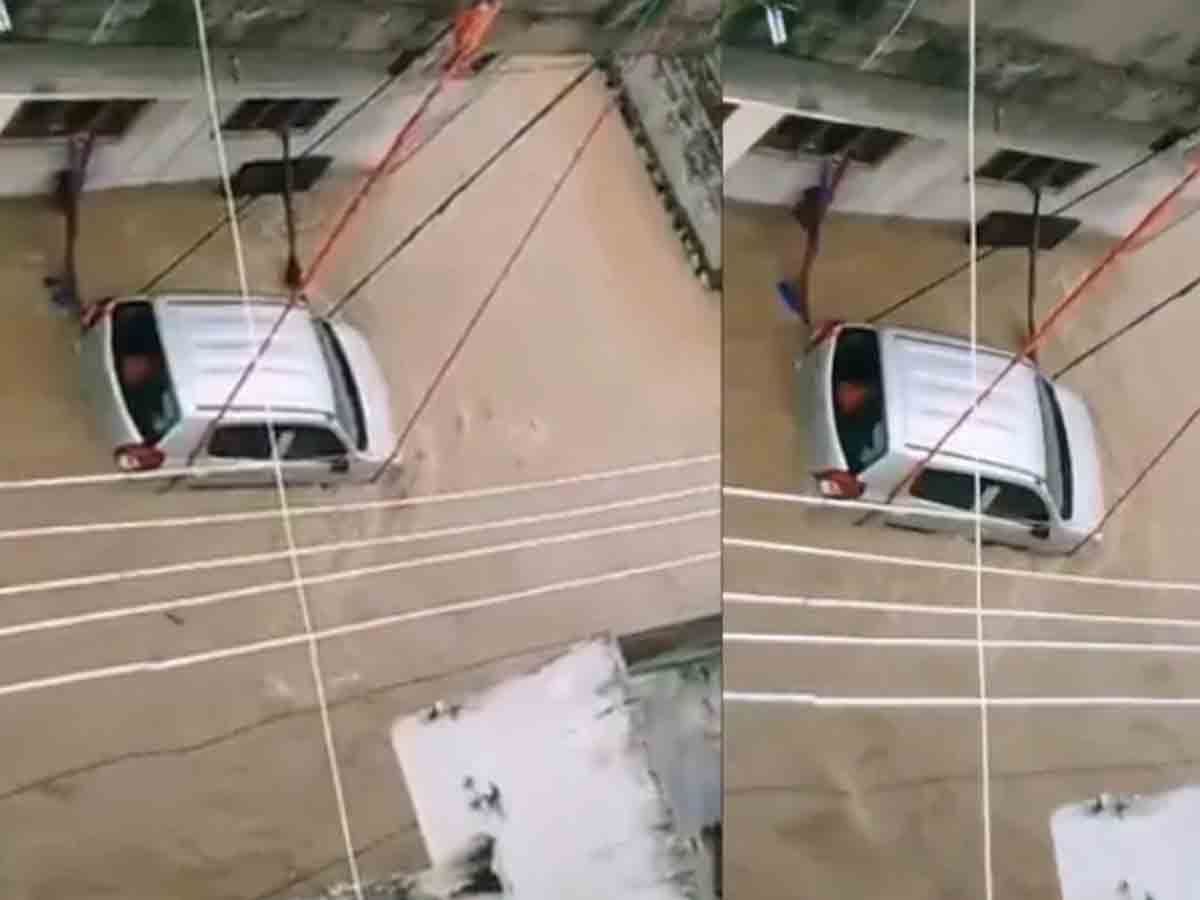 Viral Video: వరదల్లో కొట్టుకుపోకుండా.. కారును తాళ్లతో కట్టేసిన యజమాని