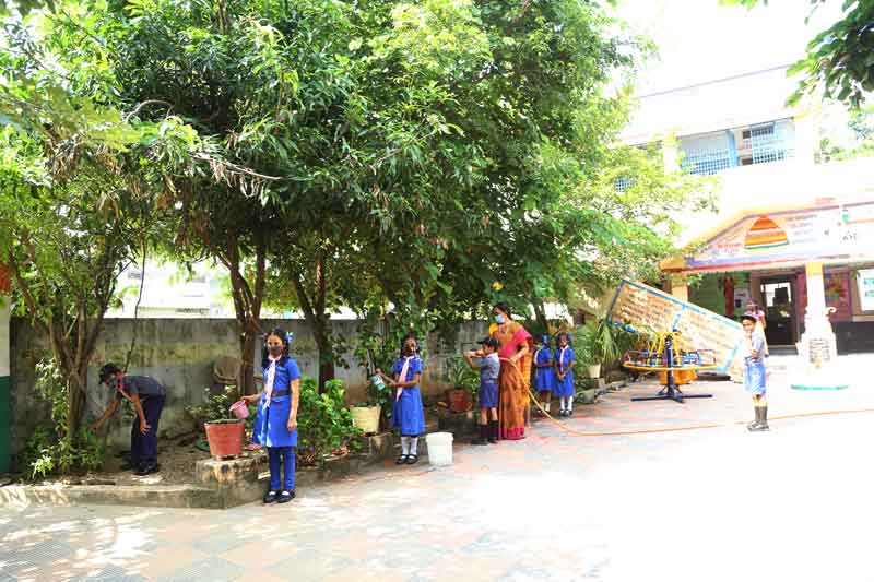 మొక్కలకు నీళ్లు పోశాకే బడిలోకి..