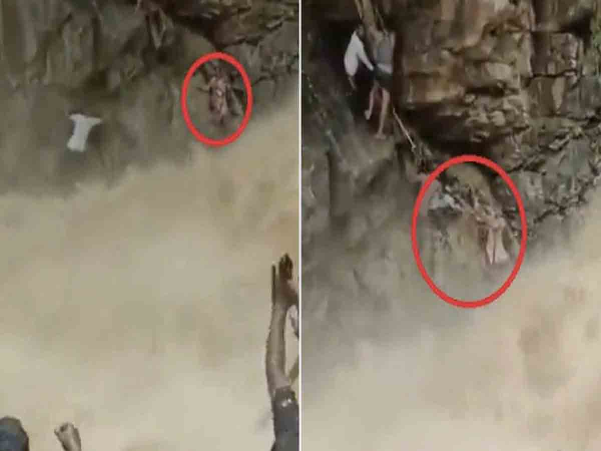 జలపాతం వద్ద చిక్కుకున్న తల్లీబిడ్డ.. కాపాడిన సిబ్బంది