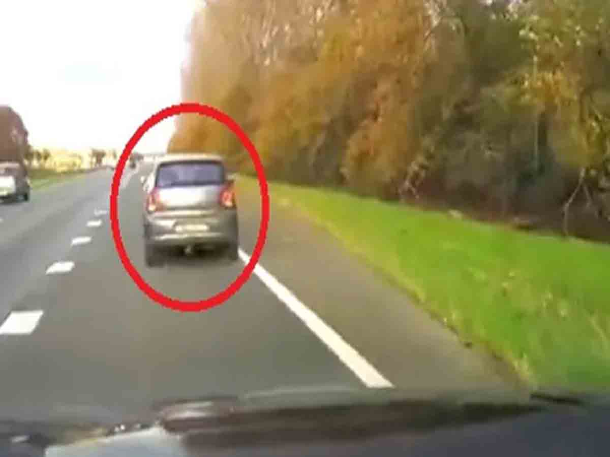 మహిళను కాపాడేందుకు.. కారును త్యాగం చేసిన వ్యక్తి