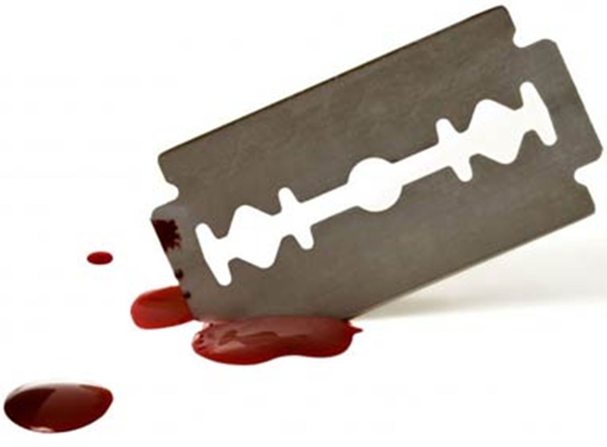 Husband attacks wife | బ్లేడుతో భార్యపై భర్త దాడి