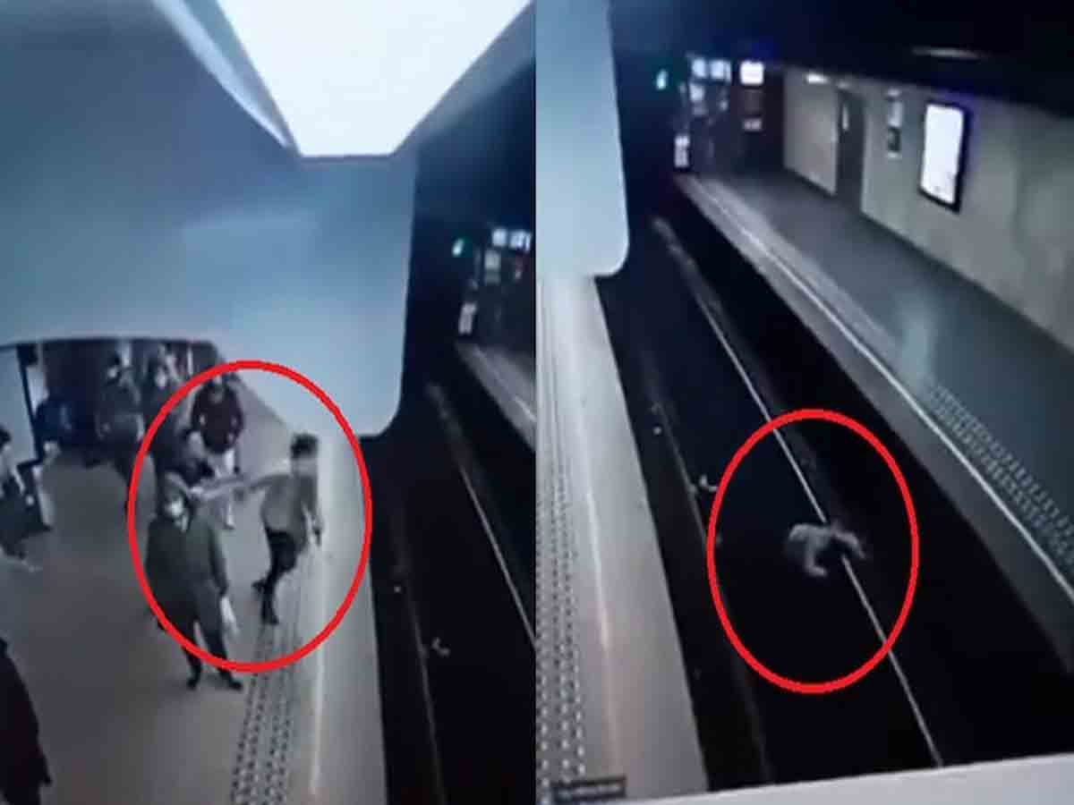 Viral video: రైలు వ‌స్తుండ‌గా ప‌ట్టాల మీద‌కు మ‌హిళను తోసేశాడు.. త‌ర్వాత ఏమైందంటే?