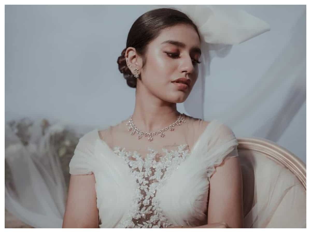 Priya Prakash Varrier | వైట్‌ డ్రెస్‌లో ప్రియా ప్రకాష్ వారియర్ సోయగం..