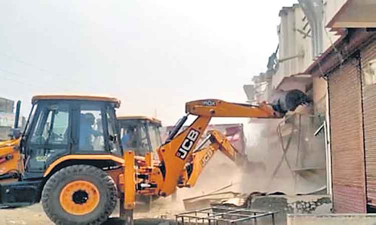 Peerjadiguda | పీర్జాదిగూడలో ప్రభుత్వ స్థలాల్లో చేపట్టిన కట్టడాల కూల్చివేత