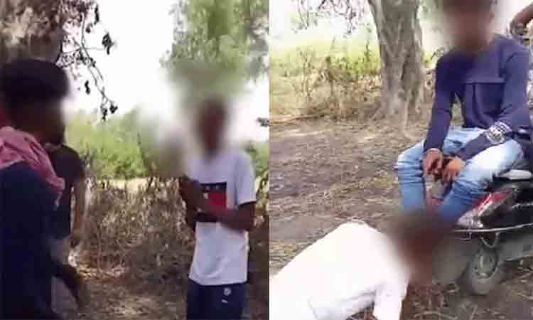 దళిత బాలుడితో కాళ్లు నాకించారు!