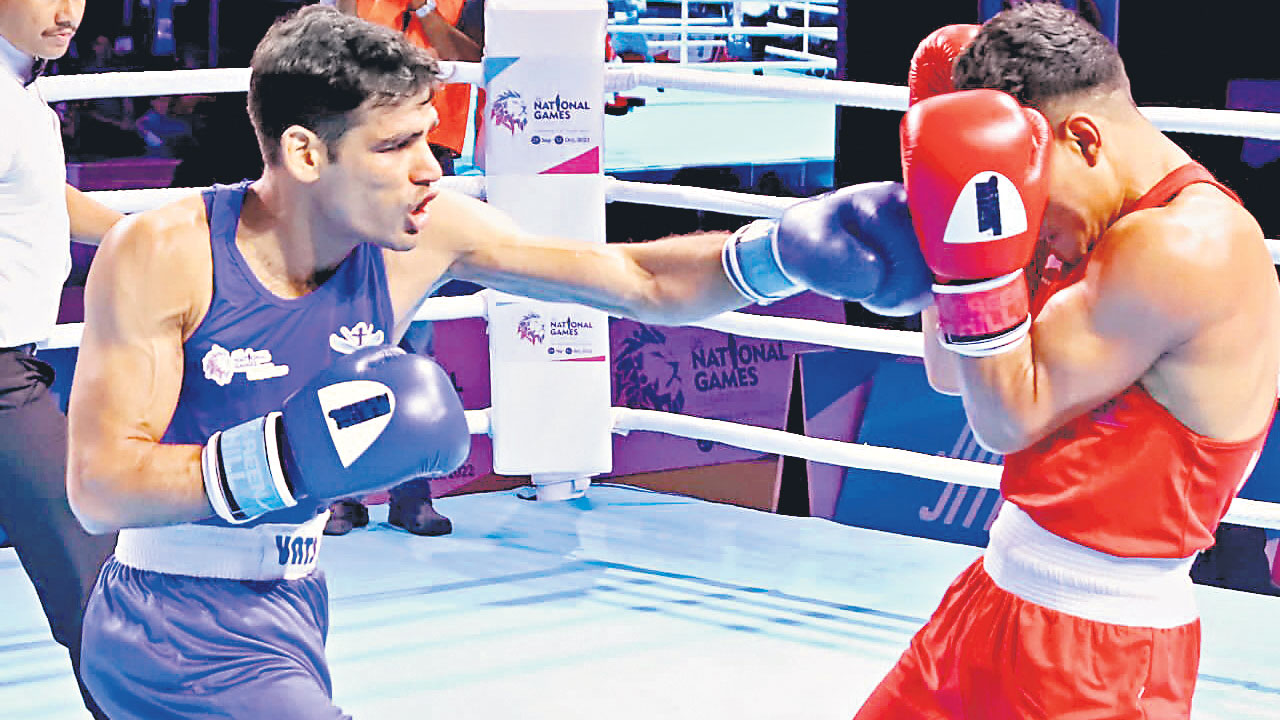 హుసామ్‌ పసిడి పంచ్‌