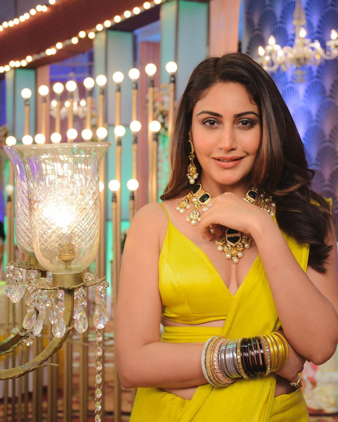 Surbhi Chandna dazzles in a modern  shimmery winecoloured sari See Pics