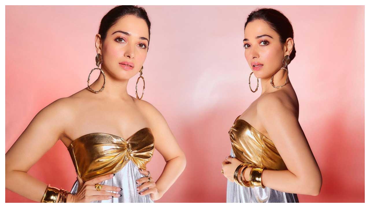 Tamannaah Bhatia | స్లీవ్ లెస్ డ్రెస్‌లో అందాలు ఒల‌క‌బోస్తున్న‌ తమన్నా భాటియా..
