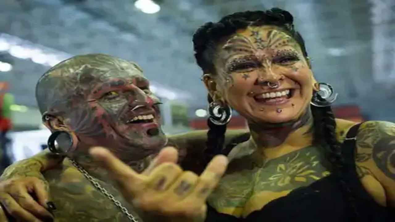 Tatto couple | ఒంటి నిండా టాటూలతో గిన్నిస్‌ బుక్‌లోకెక్కిన జంట