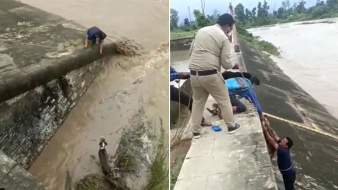 ప్రాణాల‌కు తెగించి నీటి ప్ర‌వాహంలో చిక్కుకున్న కుక్క‌ను కాపాడాడు