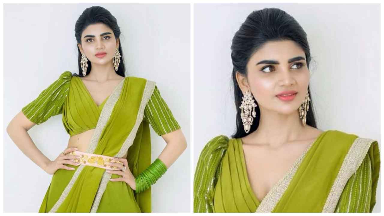 Varsha | చిలుకపచ్చ రంగు లంగా ఓణీలో అలరిస్తున్న వర్ష..