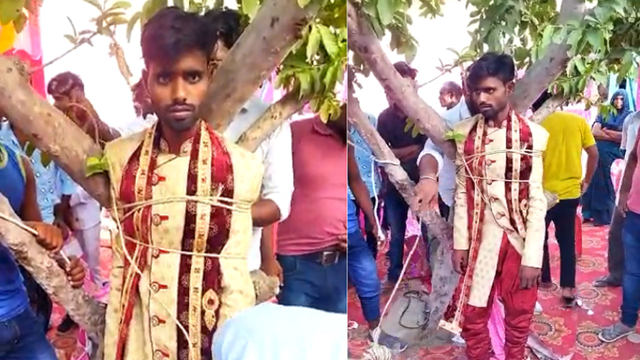 Groom Hostage | వరుడిని చెట్టుకు కట్టేసిన వధువు కుటుంబం.. బంధీలుగా చుట్టాలు..! అసలు విషయం ఏంటంటే..?