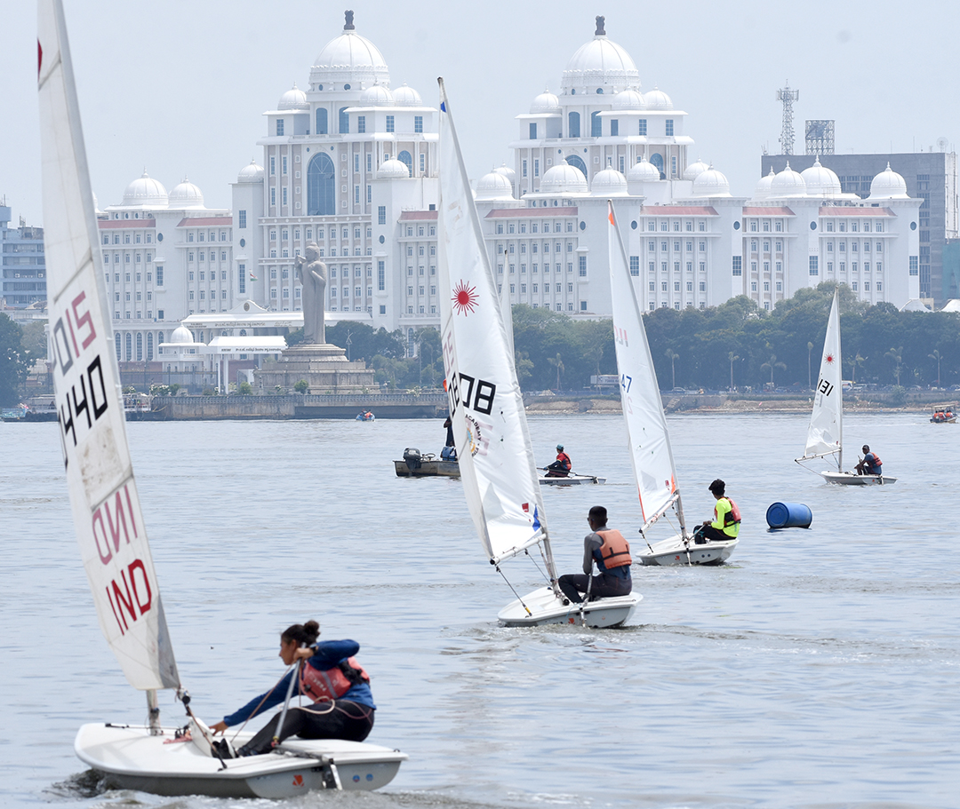 Sailors in action during the 37th Hyderabad Sailing Week 2023 at Secunderabad Sailing Club in Hussain Sagar on Tuesday