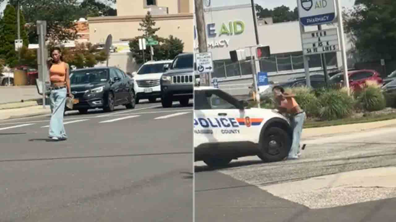 Watch: జంక్షన్‌ వద్ద కార్లపై గన్‌ గురిపెట్టిన మహిళ.. పోలీసులు ఏం చేశారంటే?