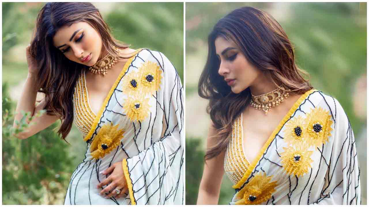Mouni Roy | తెల్ల చీరలో మౌనీ రాయ్ హొయలు..