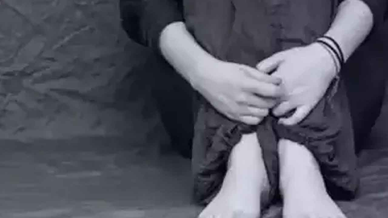 మహిళను నగ్నంగా ఊరేగించి..