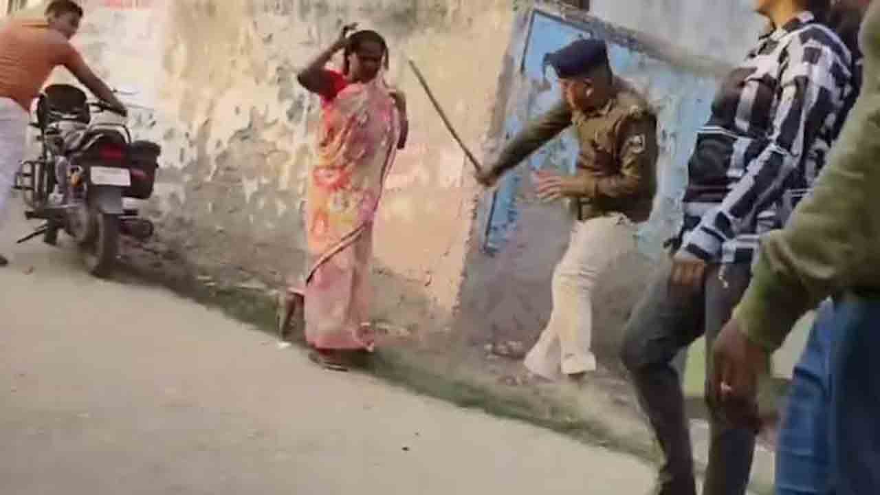 Dalit woman | దళిత మహిళపై పోలీసు దాష్టీకం.. కర్రతో చితకబాది