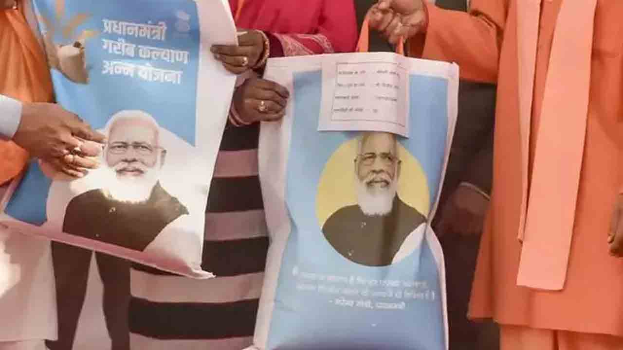 PM Modi | మోదీ ఫొటోతో ఆహార ధాన్యాల సంచులు!