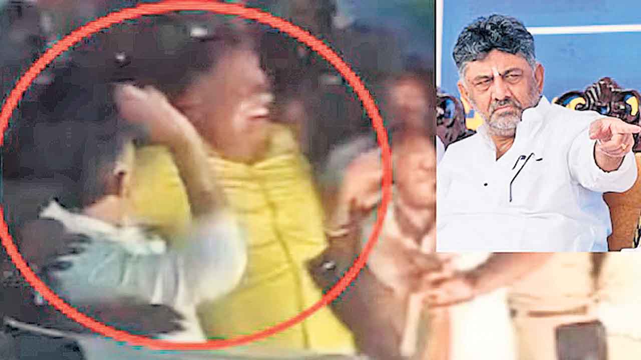 కార్యకర్తపై చేయి చేసుకున్న డీకే