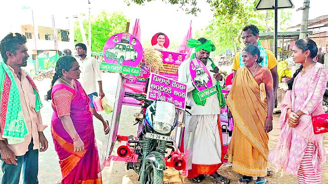 బైక్‌పై వినూత్న ప్రచారం