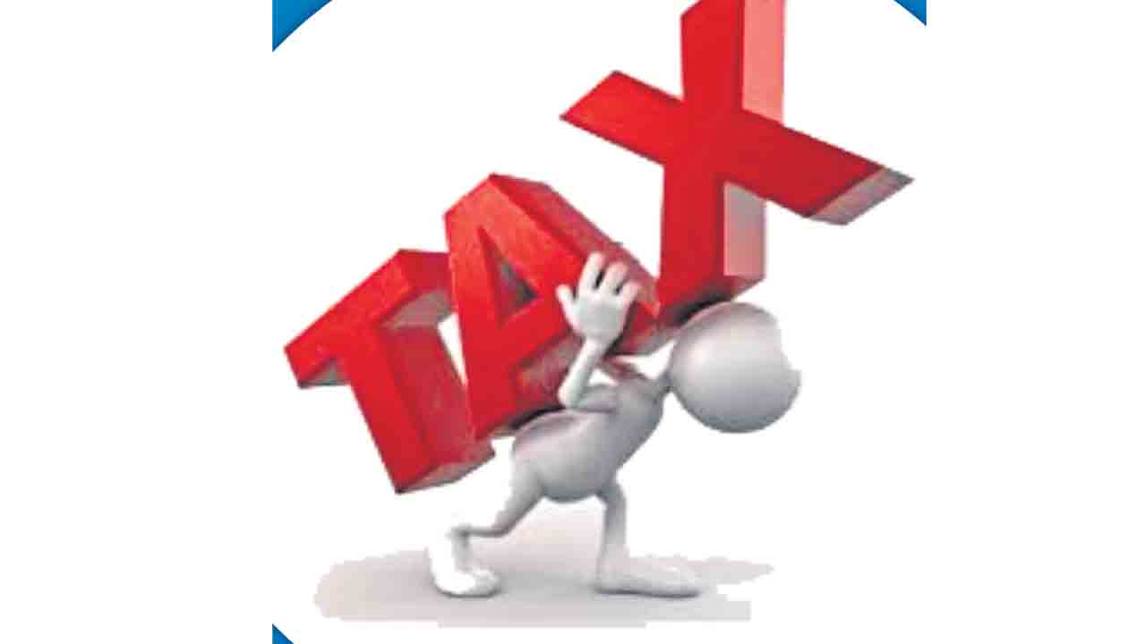 పన్ను రేట్లు తగ్గాలి