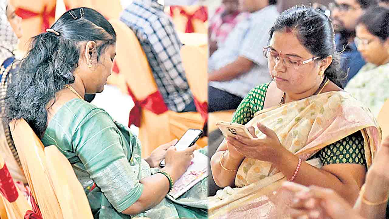 ఫోన్లలో బిజీగా అధికారులు