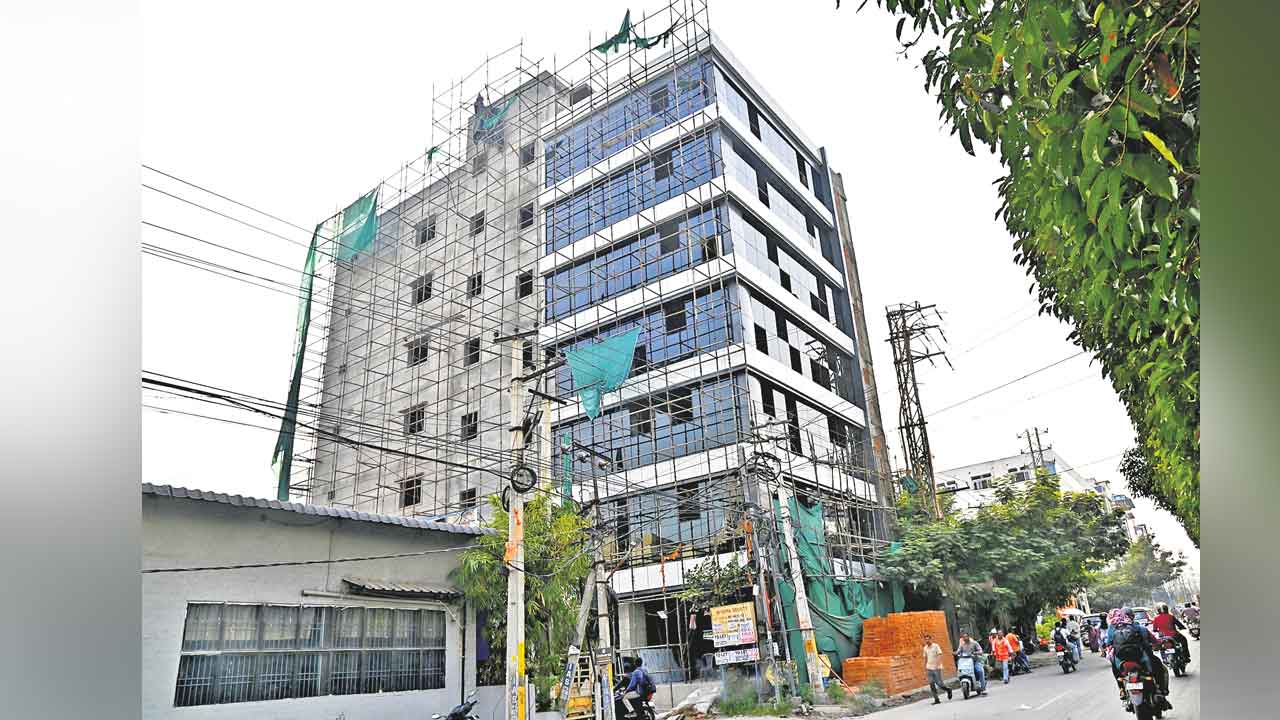 Ayyappa Society | అయ్యప్ప సొసైటీలో అక్రమ కట్టడాలు.. అంతస్థుకో రేటు!