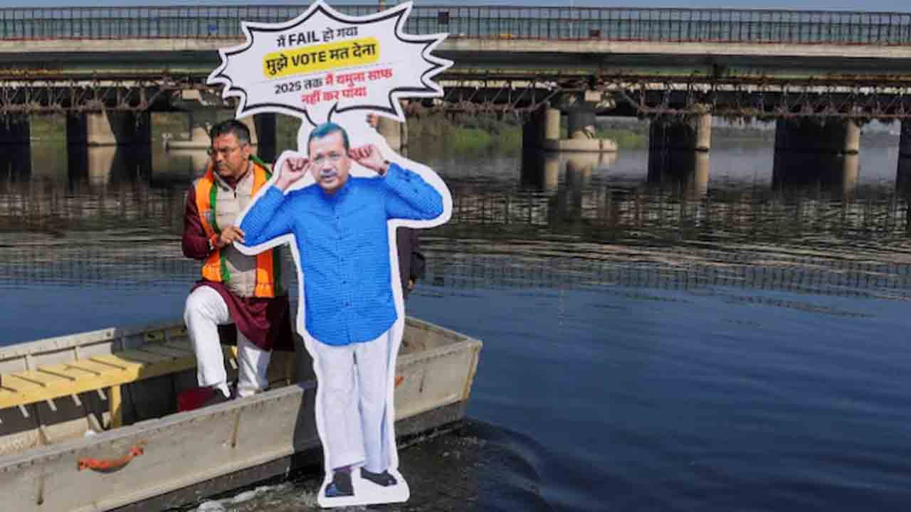 Arvind Kejriwal’s cutout | కేజ్రీవాల్ కటౌట్ను యమునా నదిలో ముంచిన పర్వేష్ వర్మ.. ఎందుకంటే?