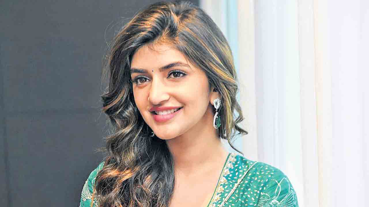 ఫొటో వెనక మతలబు