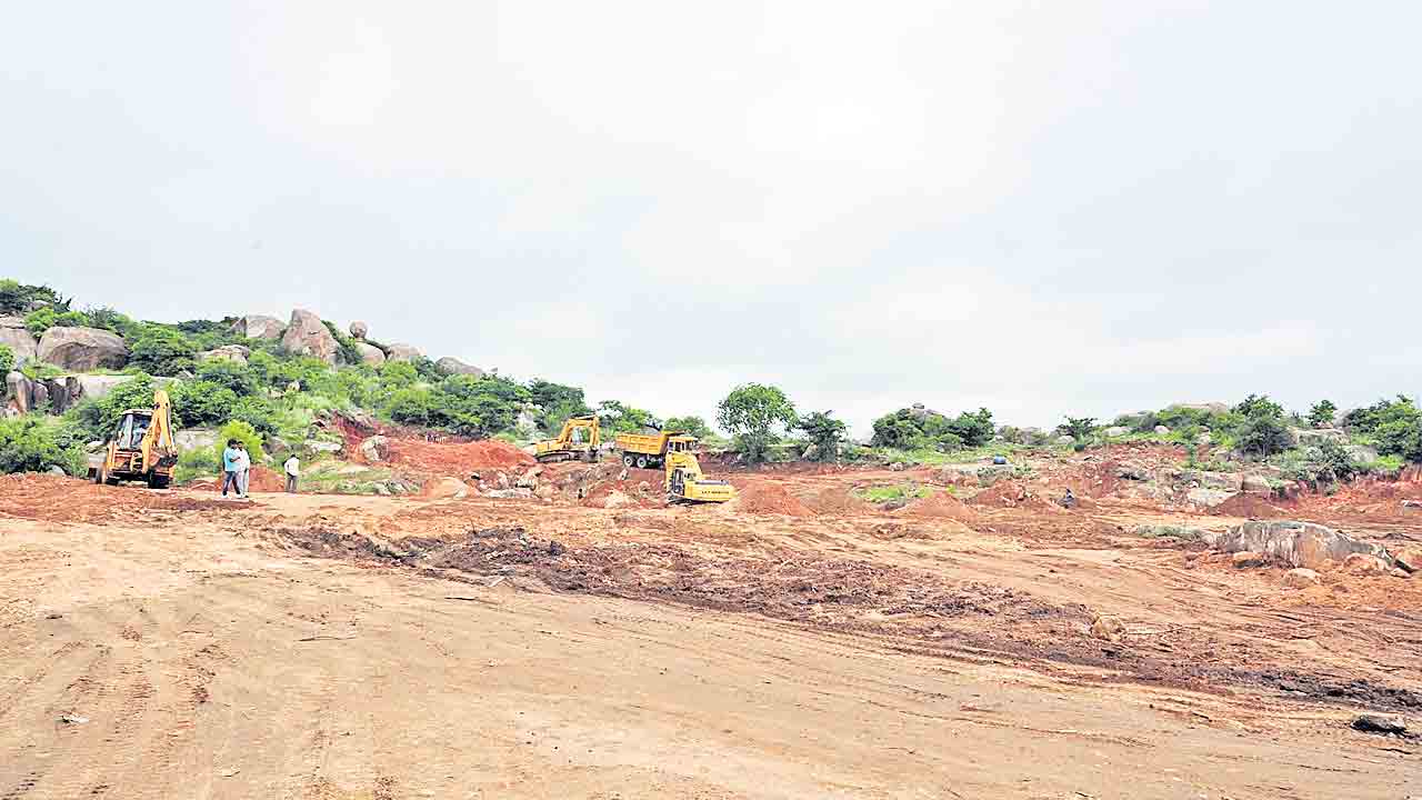 పేదల భూములపై సర్కారు కన్ను!