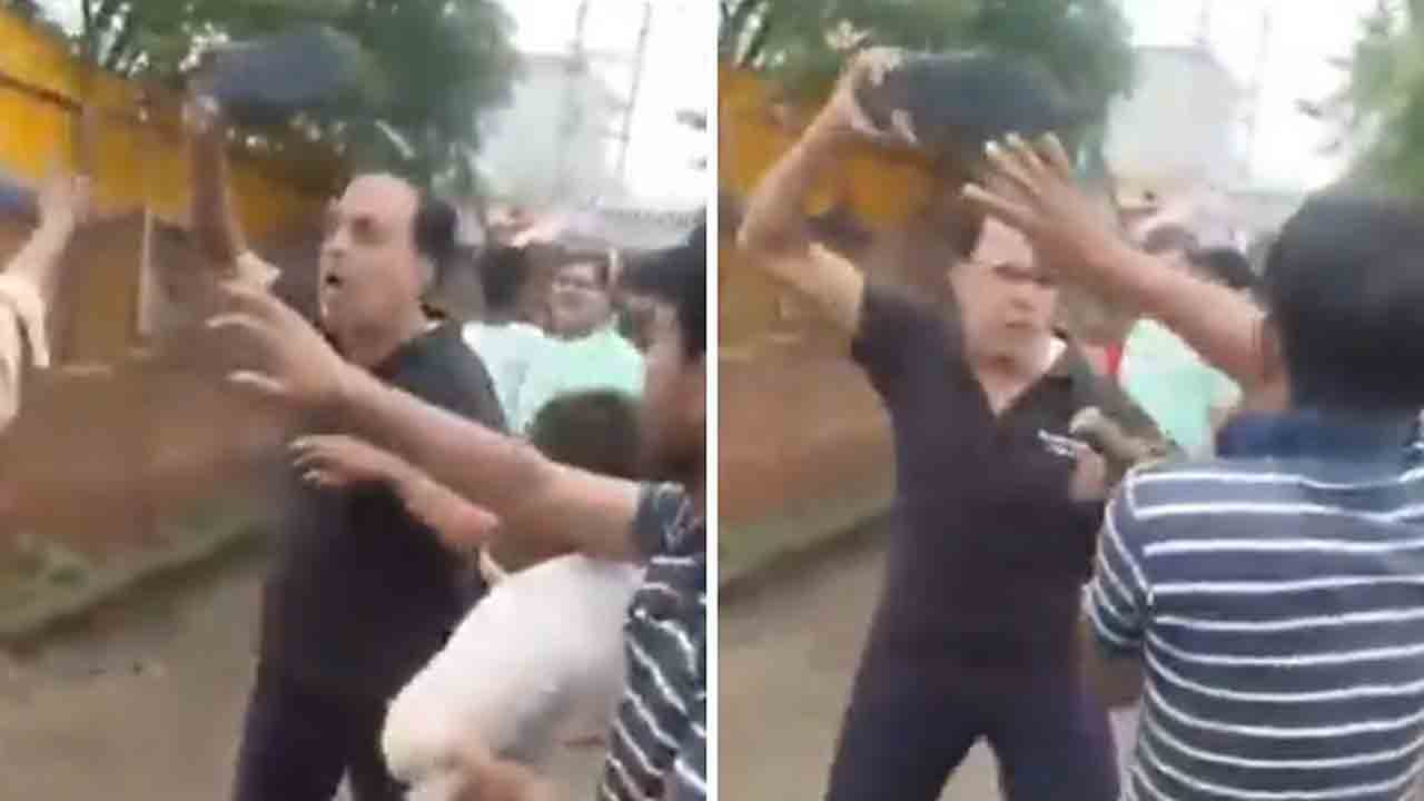 BJP Leader Assaults Woman | మహిళ, ఆమె కుమారుడ్ని చెప్పుతో కొట్టిన   బీజేపీ నేత.. వీడియో వైరల్తో అరెస్ట్