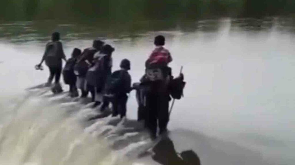 Children Cross Gushing Rive