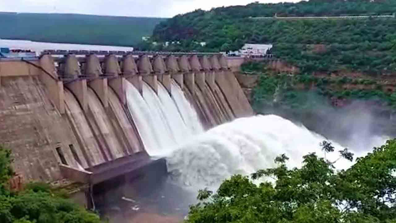 Srisailam project | శ్రీశైలం ప్రాజెక్టు 4 గేట్లు ఎత్తి నీటి విడుదల