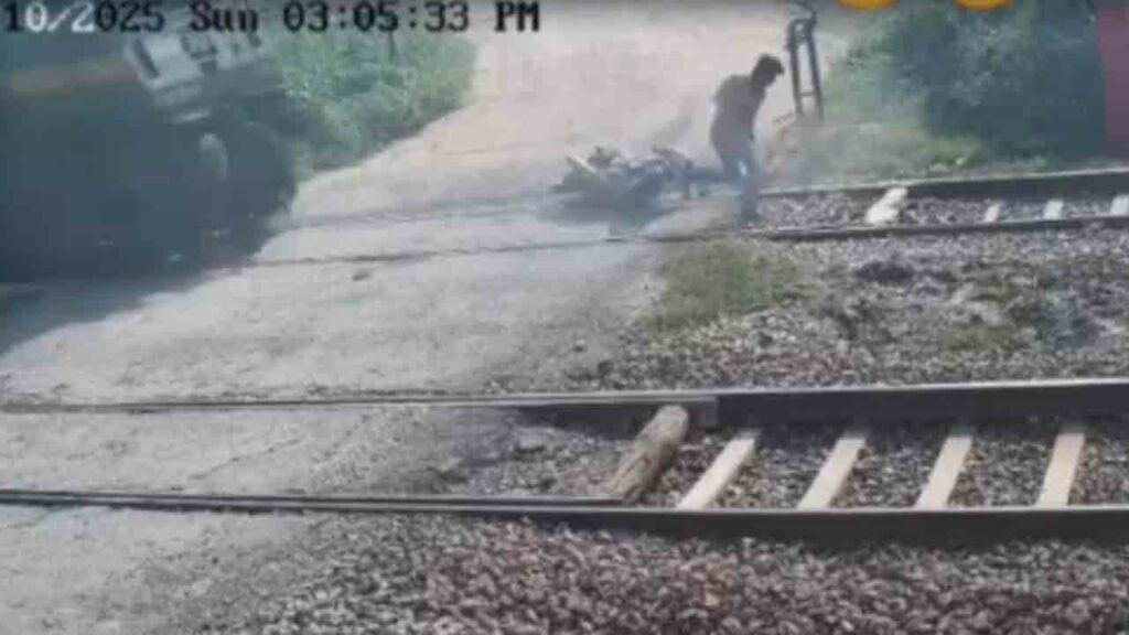 Man Falls From Bike While C