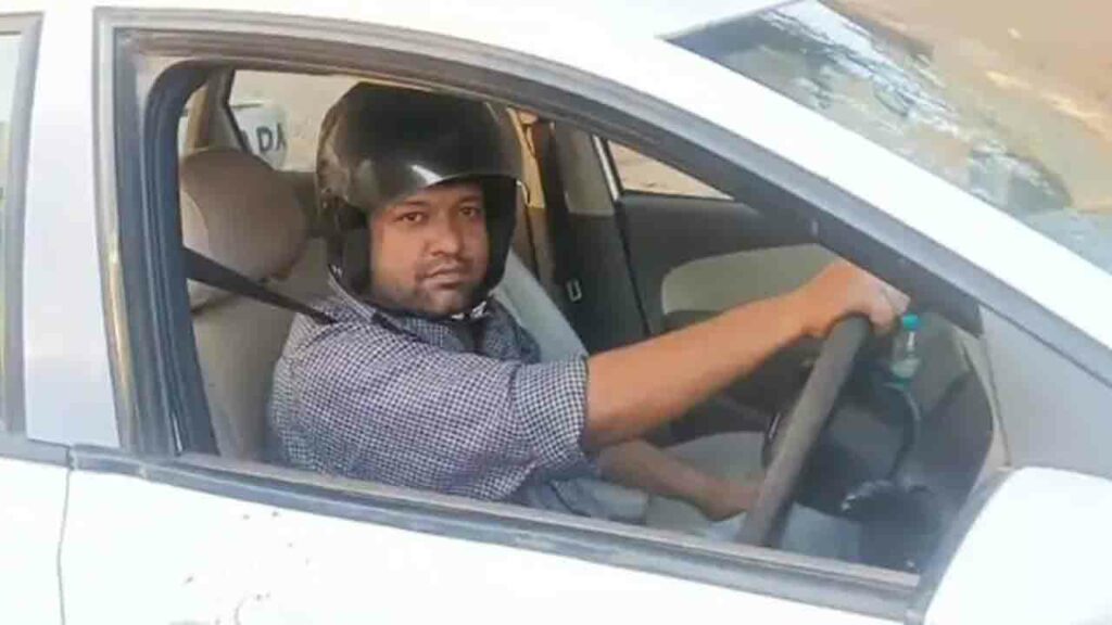 Man Drives Car Wearing Helm