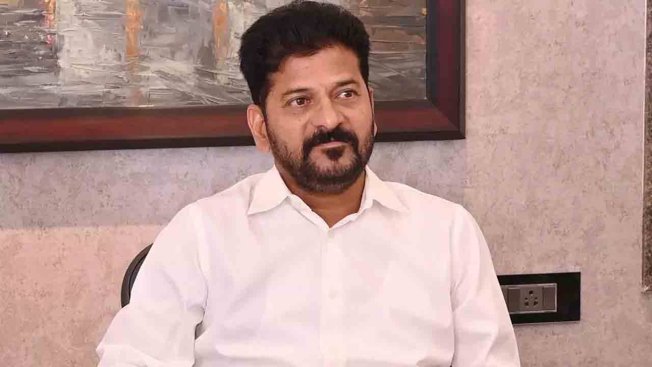 కాంగ్రెస్‌కు భూ కేటాయింపును ప్రశ్నించరా?