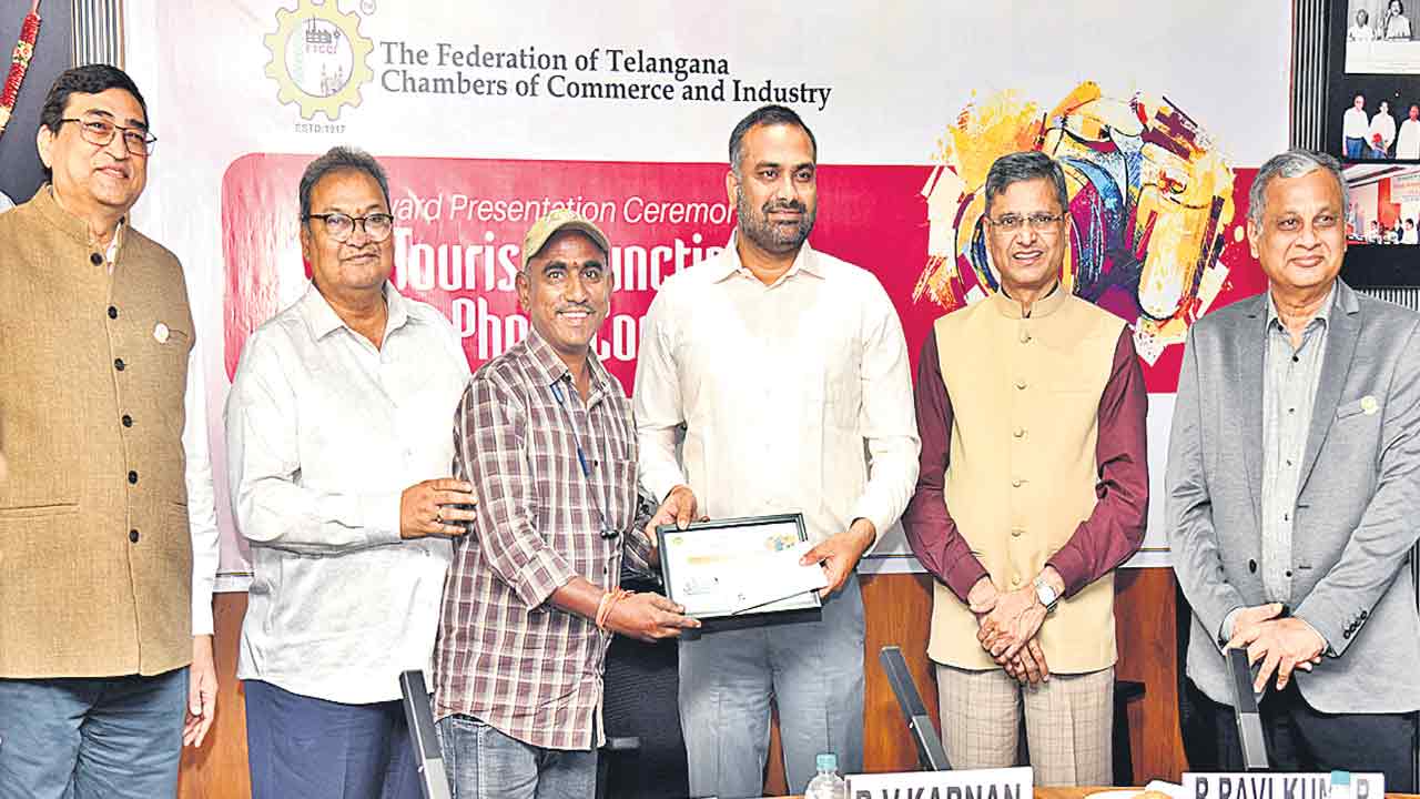 ‘నమస్తే తెలంగాణ’ ఫొటో జర్నలిస్టు రజినీకాంత్‌గౌడ్‌కు మొదటి బహుమతి