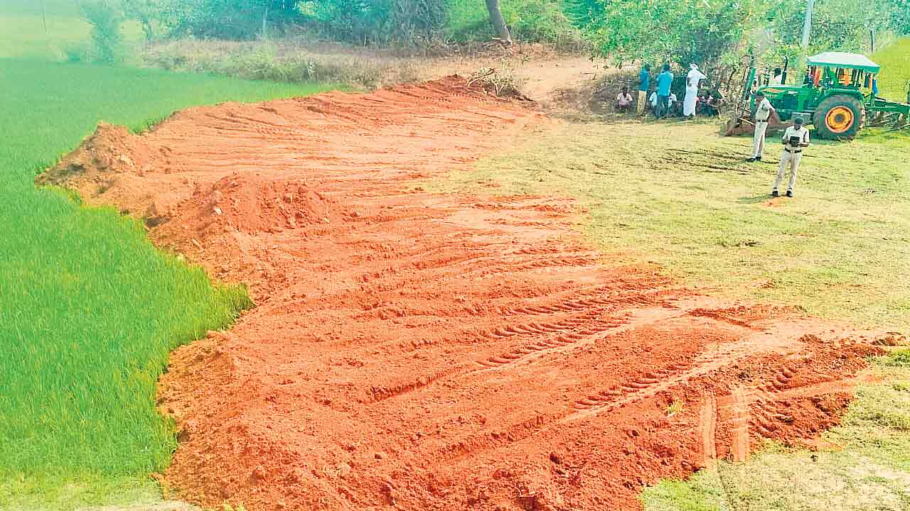 దళిత రైతుపై మంత్రి అనుచరుడి జులుం