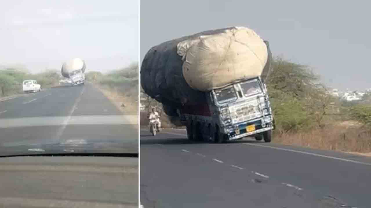 Watch: భారీ గడ్డి లోడ్‌తో వెళ్తున్న లారీ.. అదుపుతప్పి ఊగిపోతూ బోల్తా