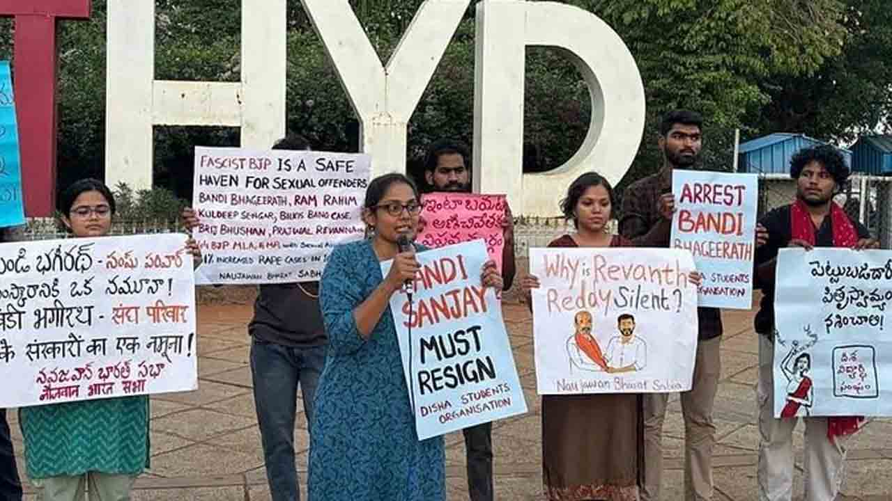 Bandi Bhagirat | బండి భగీరథ్‌ను అరెస్ట్‌ చేయాలని నెక్లెస్ ప్లాజా వద్ద స్వచ్ఛంద సంస్థల ఆందోళన